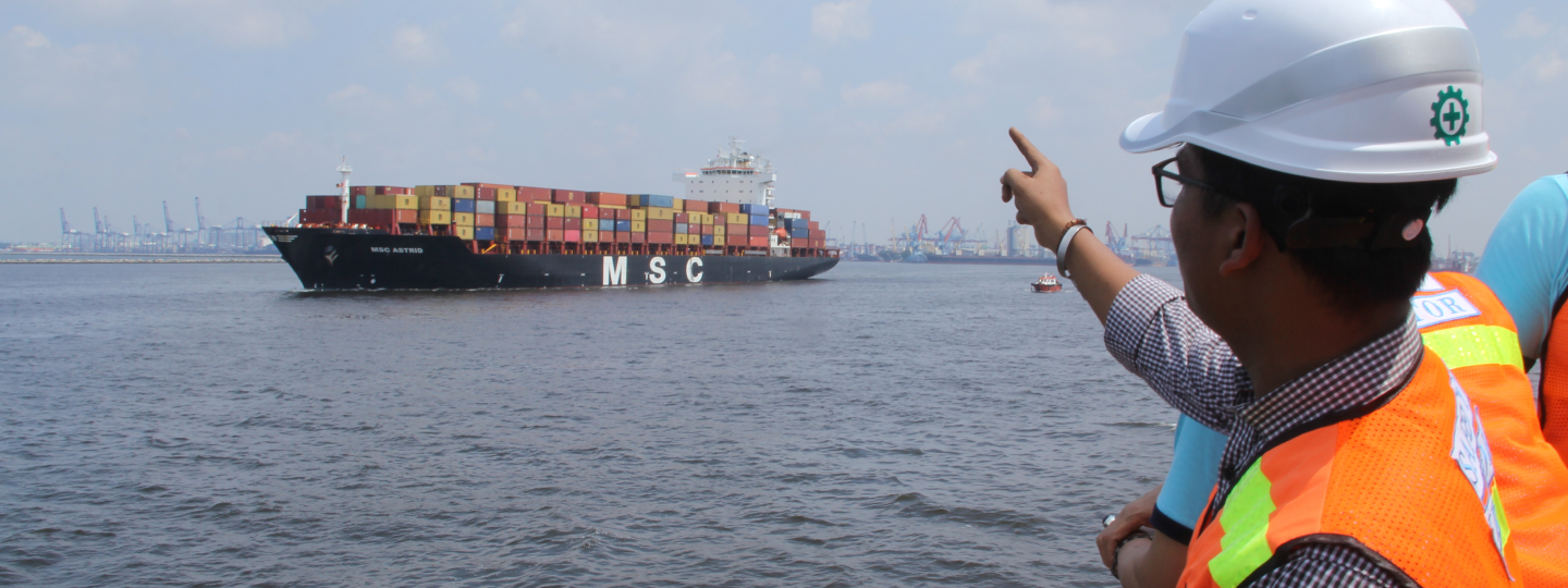 A conceptual illustration showing a green landscape with wind turbines, solar panels, and a river flowing through a forest, symbolizing sustainable environmental assessment